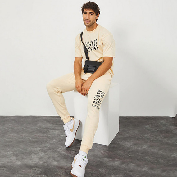 https://fitdrop.in/products/men-cream-colored-solid-slim-fit-cotton-joggers